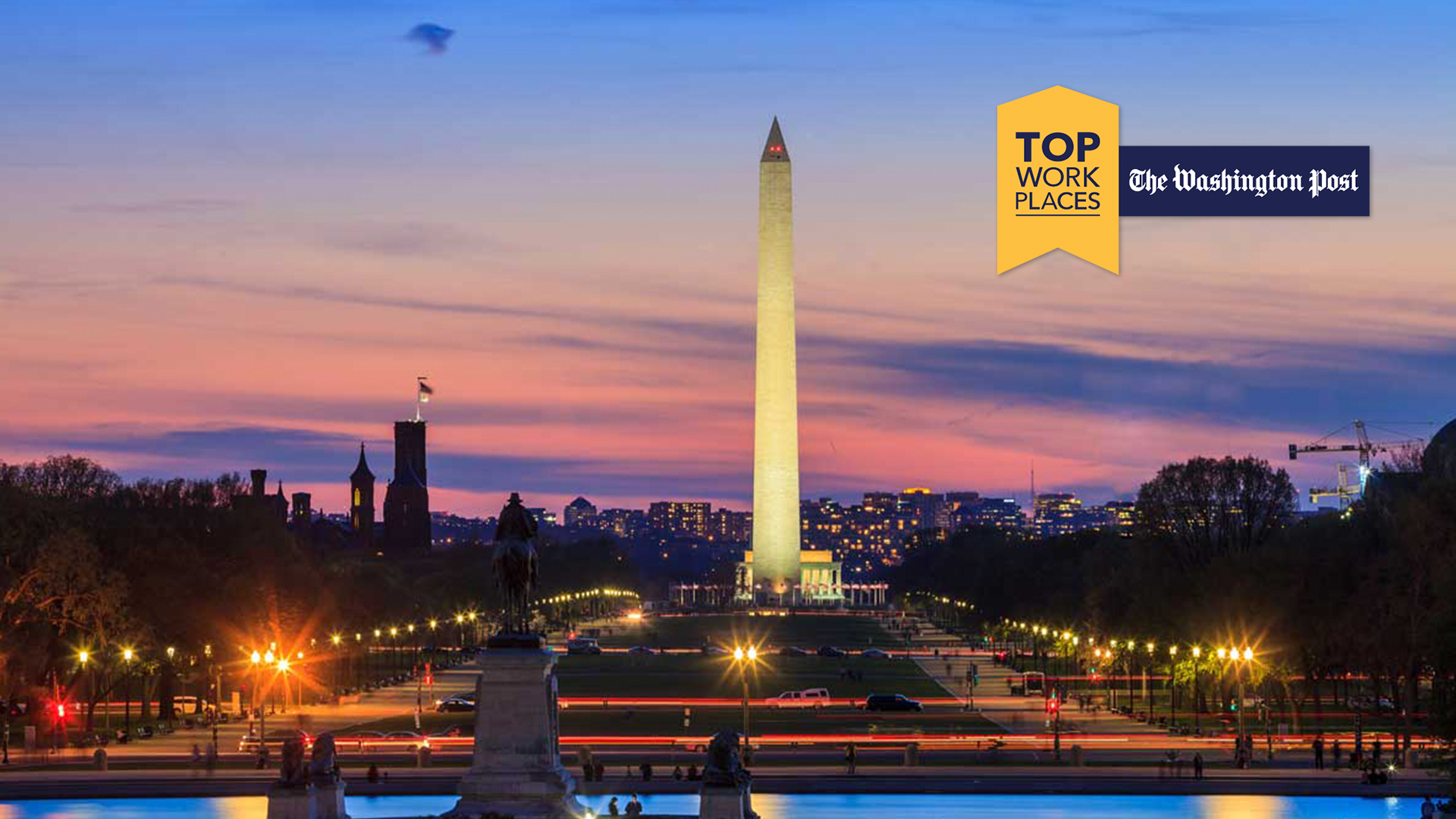 Image of the National Mall with the Washington Monument at dusk with the Washington Post Top Workplaces logo in the top right corner